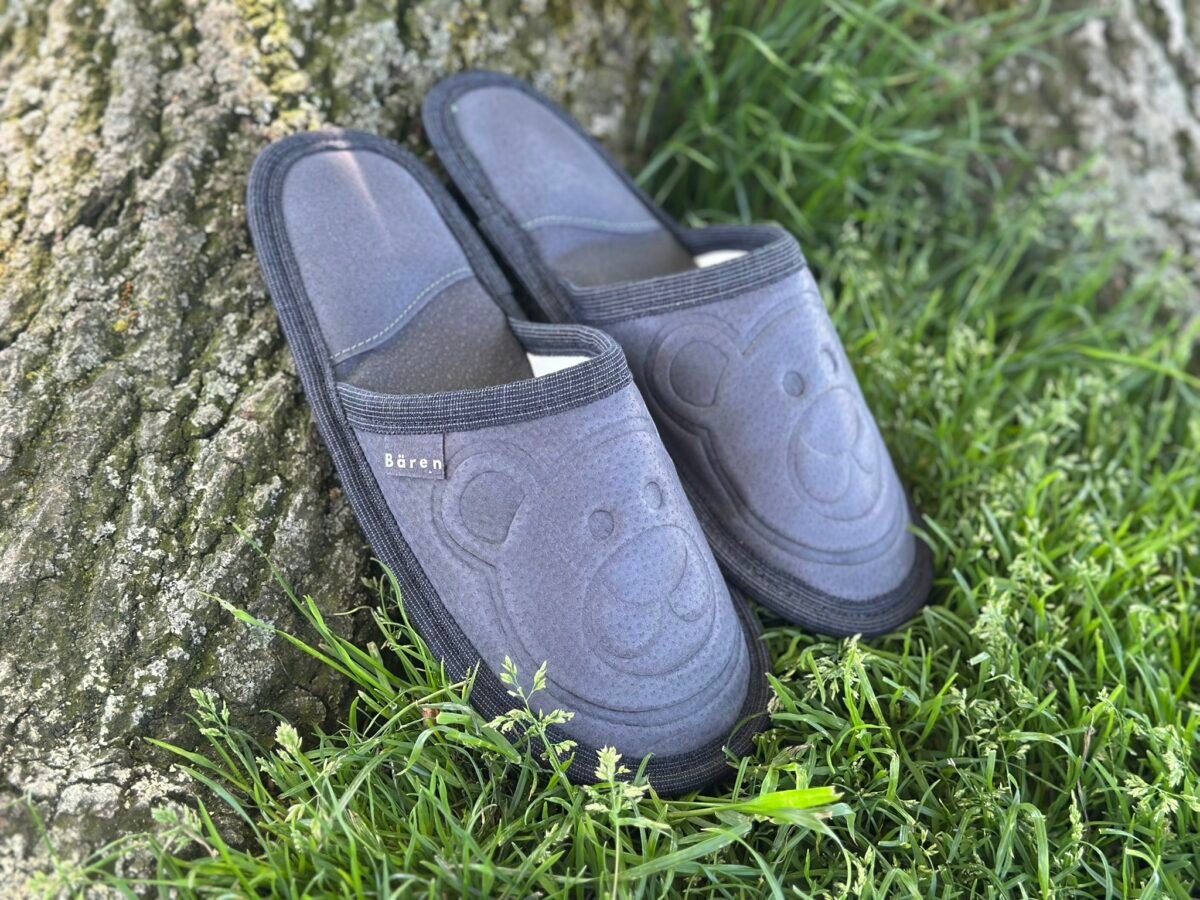 gray slippers on the grass
