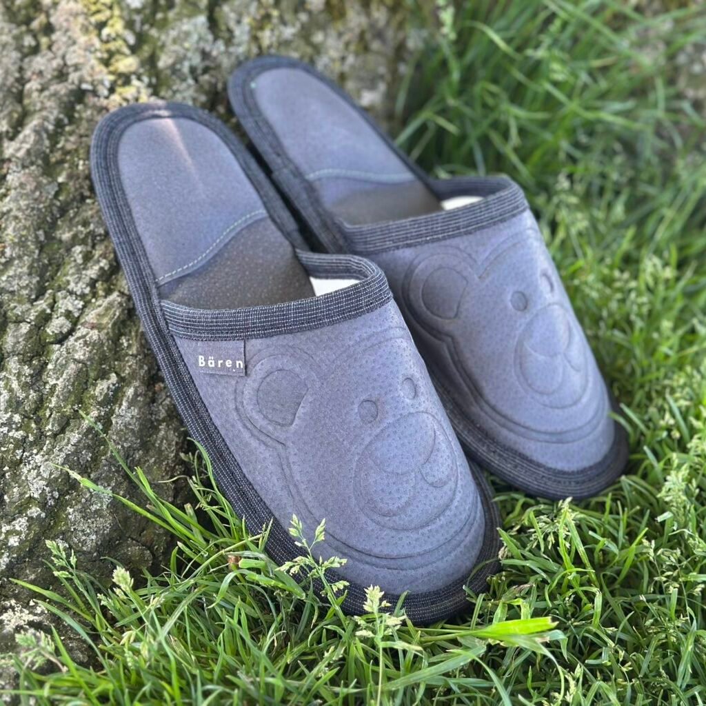 gray slippers on the grass